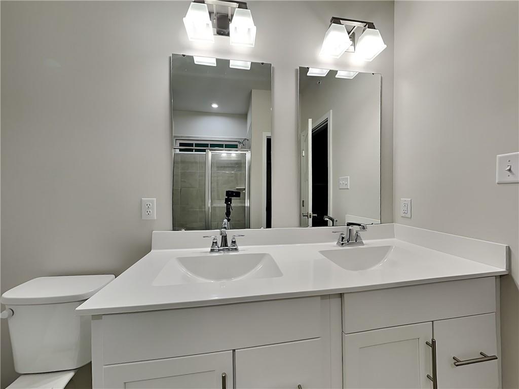 4806 Spruce Road Gibsonia, PA 15044 - Photo 19 of 49 a bathroom with a sink and a mirror
