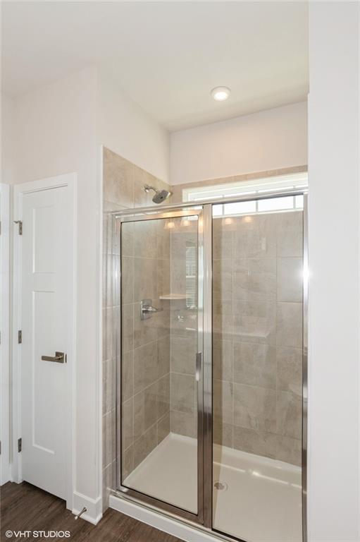 4806 Spruce Road Gibsonia, PA 15044 - Photo 22 of 49 a bathroom with a glass shower door
