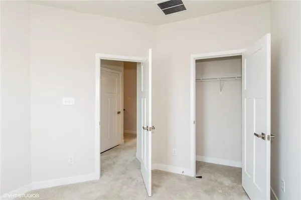 wooden floor and closet in a room