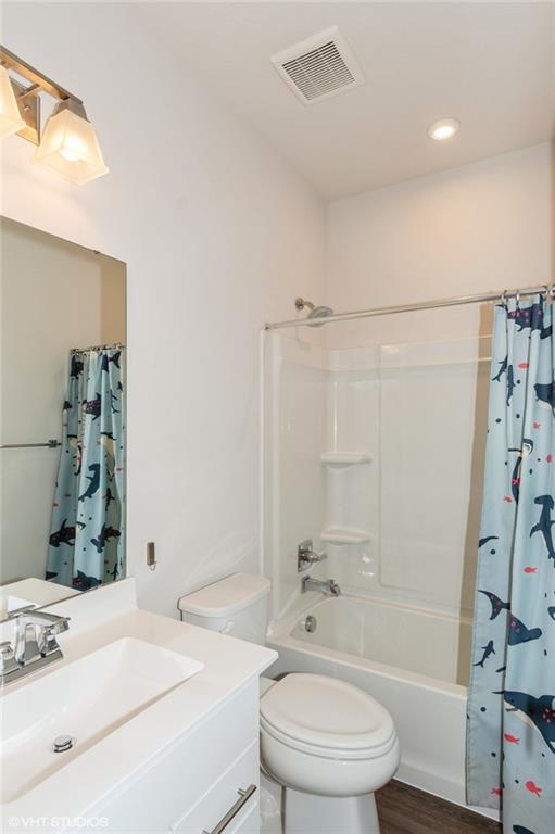 4806 Spruce Road Gibsonia, PA 15044 - Photo 31 of 49 a bathroom with a sink a toilet and shower