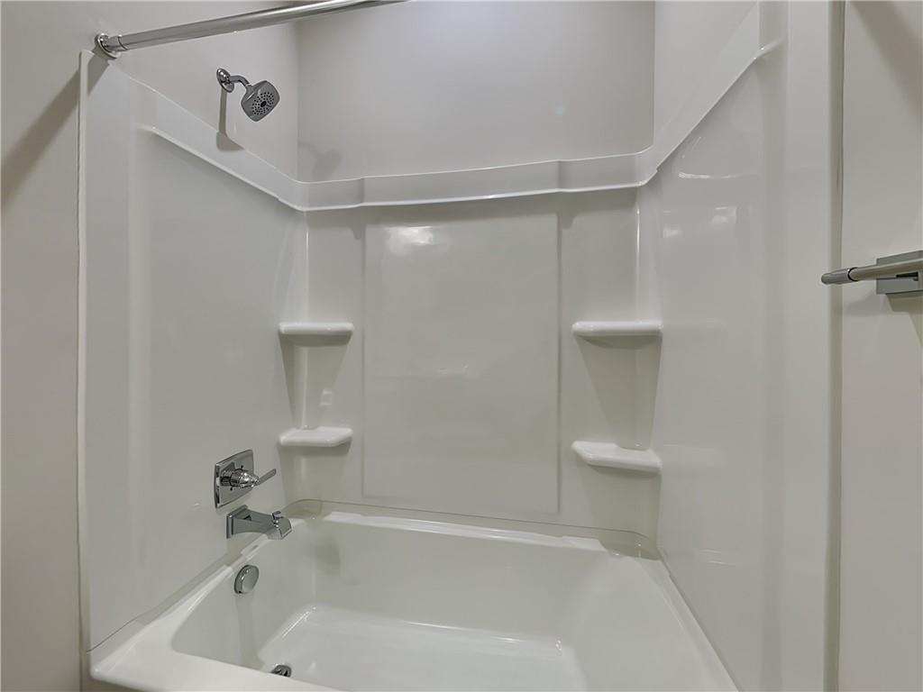 4806 Spruce Road Gibsonia, PA 15044 - Photo 33 of 49 a bathroom with a bathtub