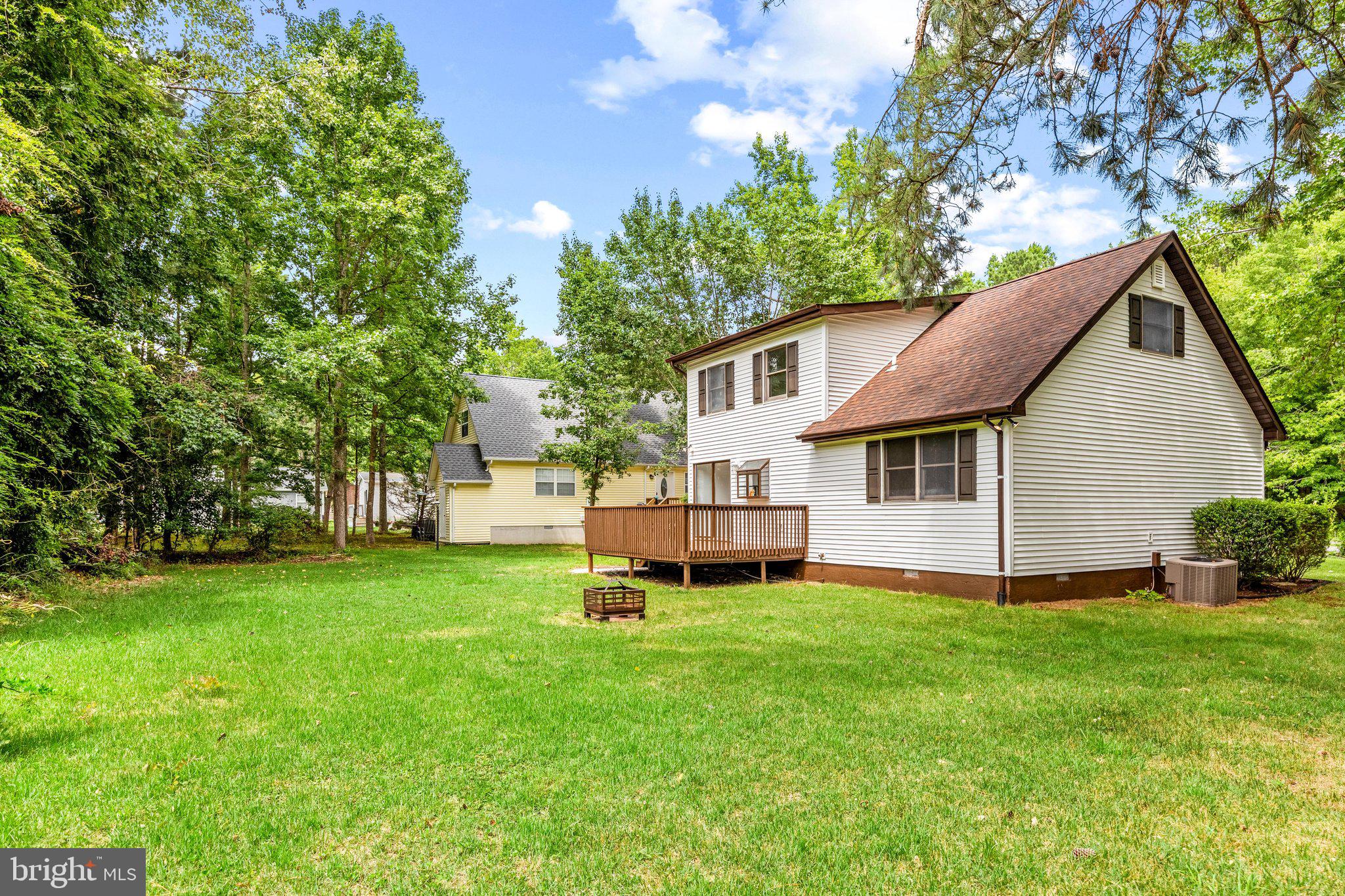 15 Raft Road Ocean Pines, MD 21811 - Photo 45 of 53 a view of a house with a yard porch and sitting area