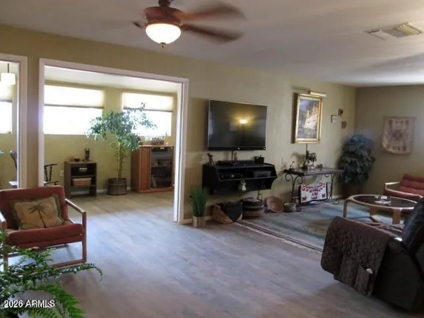 a room with furniture and a book shelf