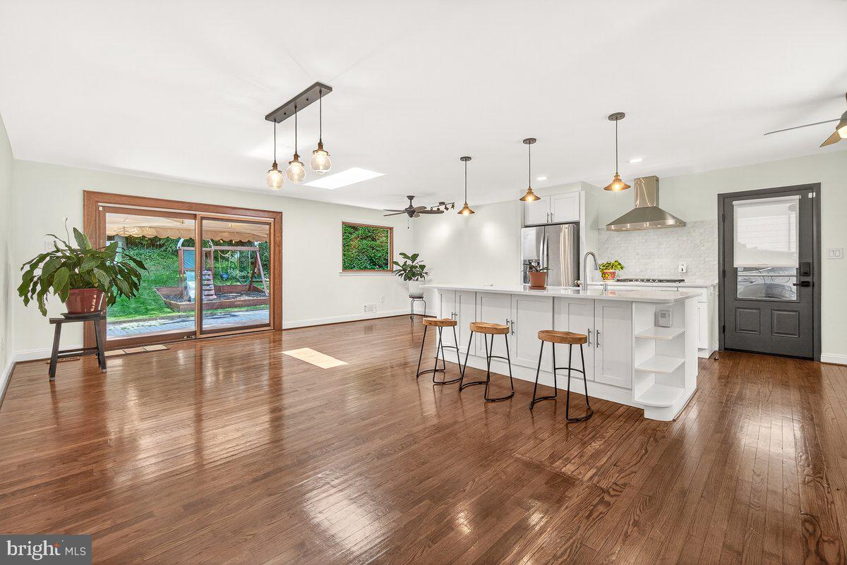 13425 Tamarack Road Silver Spring, MD 20904 - Photo 8 of 27 a dining room with furniture and wooden floor