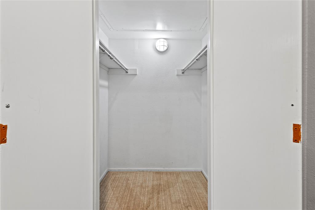 4371 Madera Road, Unit 4 Irving, TX 75038 - Photo 10 of 23 Spacious closet with light carpet