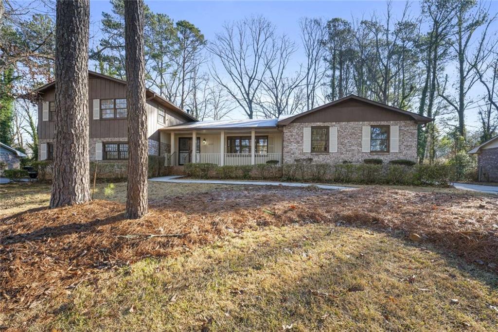 3030 Pheasant Drive Decatur, GA 30034 - Photo 1 of 1 a front view of a house with garden