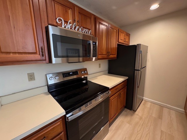 140 High Street, Unit 204 Westerly, RI 02891 - Photo 4 of 20 Immaculate & clean! The kitchen features all new appliances and flooring.