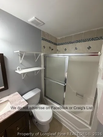 a close view of a sink and toilet