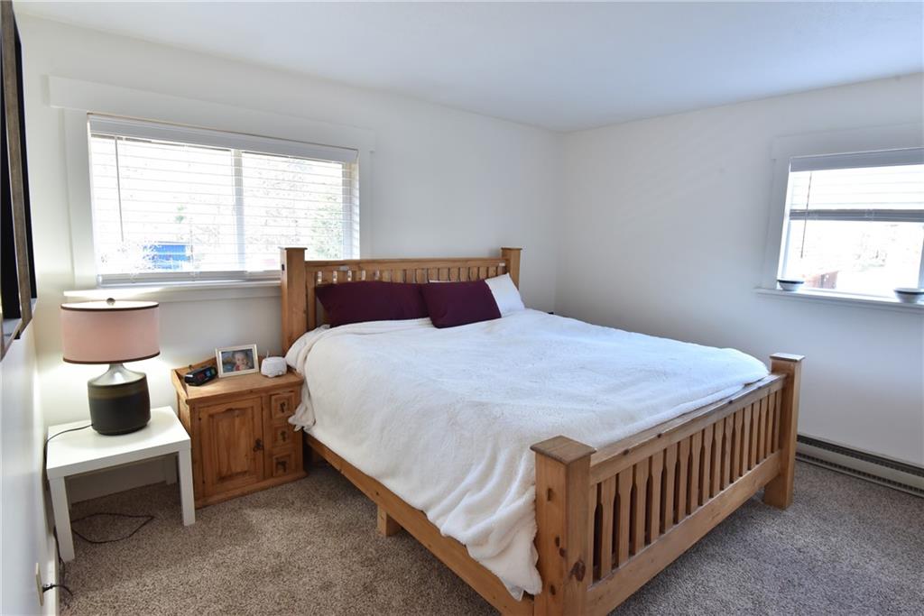 423 Big Elk Road Dillon, CO 80435 - Photo 11 of 35 a bedroom with a bed and window