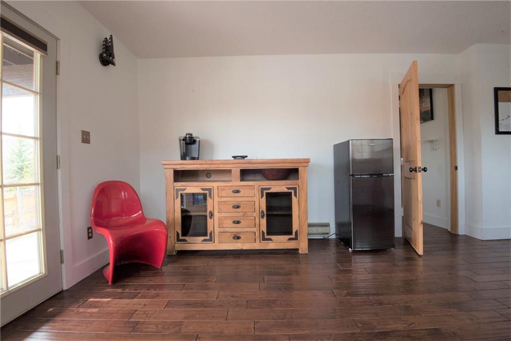 423 Big Elk Road Dillon, CO 80435 - Photo 17 of 35 a room with furniture and wooden floor