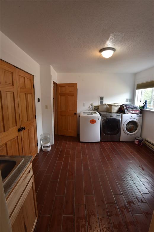 423 Big Elk Road Dillon, CO 80435 - Photo 25 of 35 a living room with furniture and a wooden floor