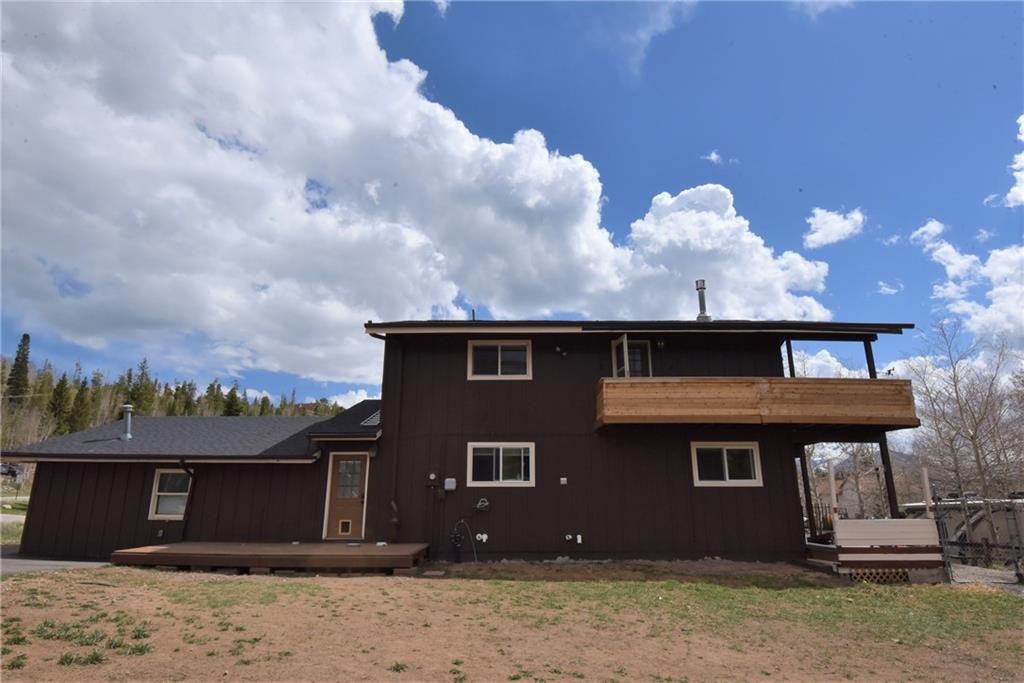 423 Big Elk Road Dillon, CO 80435 - Photo 30 of 35 a front view of a house with a yard