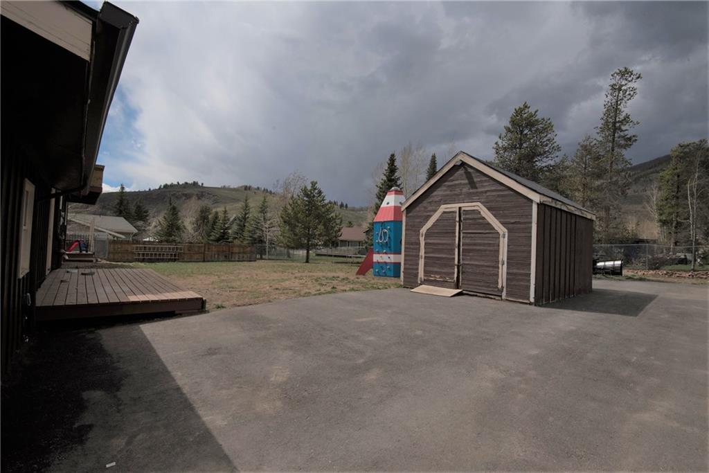423 Big Elk Road Dillon, CO 80435 - Photo 32 of 35 a view of a house with a yard