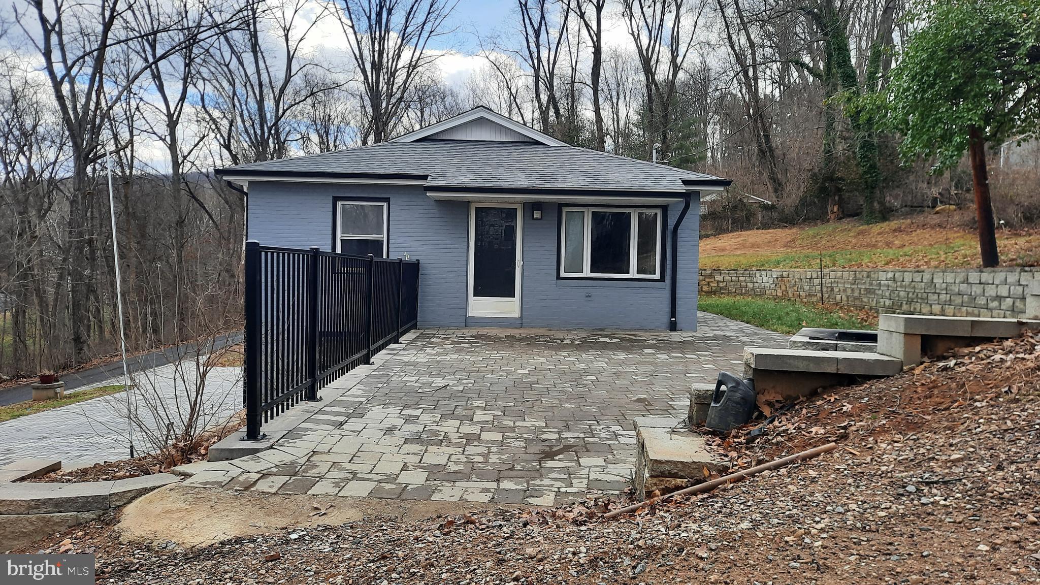 373 Bowman Road Front Royal, VA 22630 - Photo 2 of 28 a backyard of a house with barbeque oven