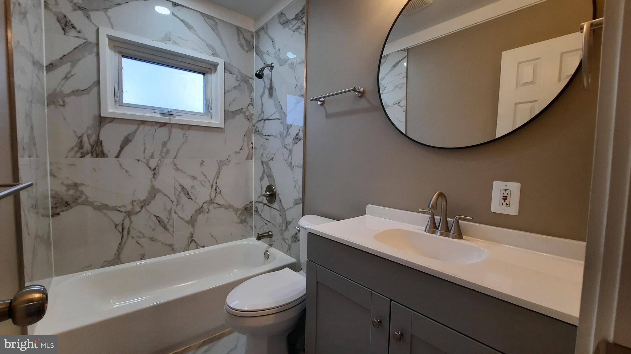373 Bowman Road Front Royal, VA 22630 - Photo 10 of 28 a bathroom with a sink a toilet and a mirror