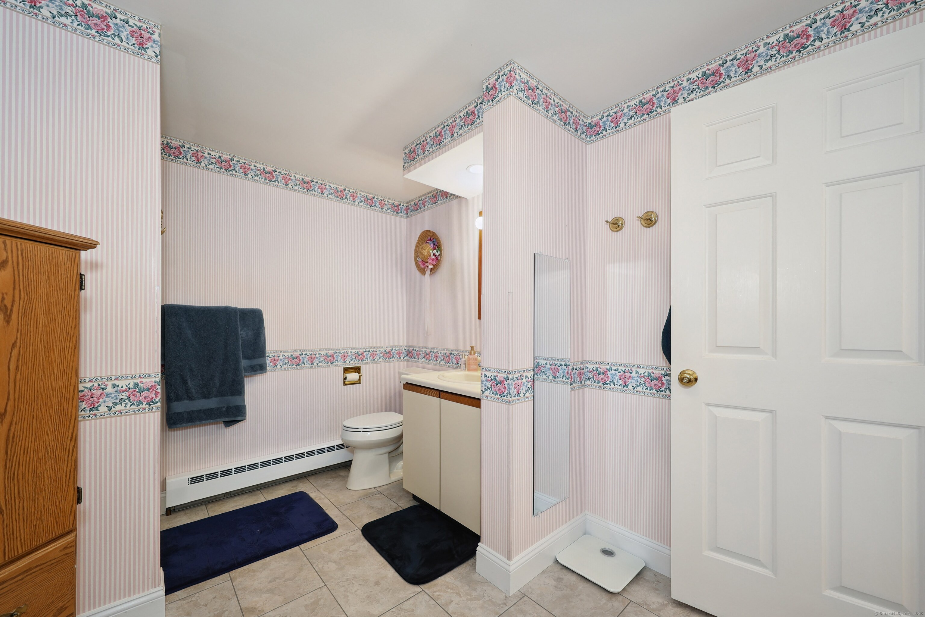 21 Hidden Pond Drive Watertown, CT 06795 - Photo 21 of 40 a bathroom with a toilet a sink and a mirror