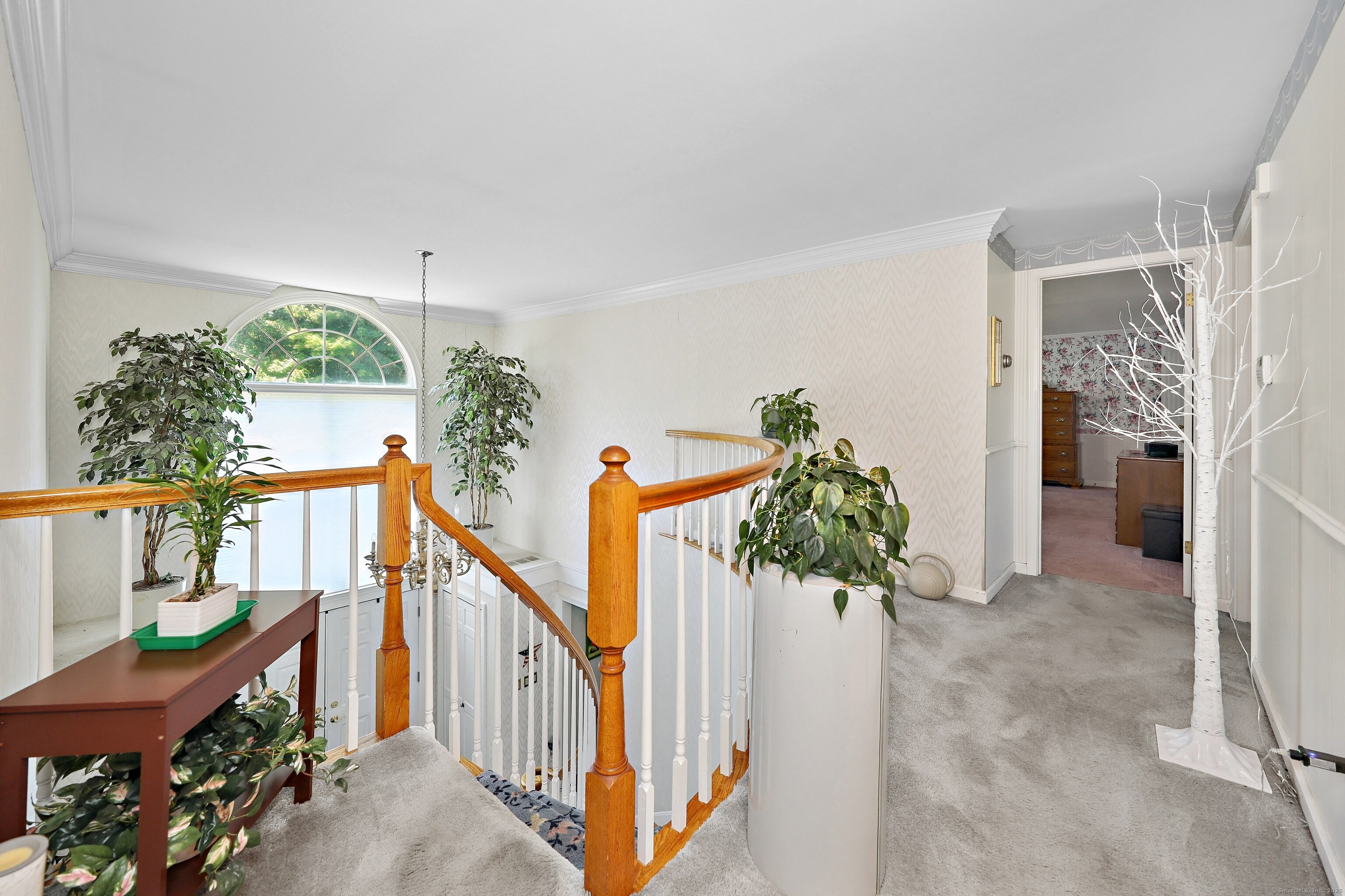 21 Hidden Pond Drive Watertown, CT 06795 - Photo 23 of 40 a view of an entryway with a potted plant