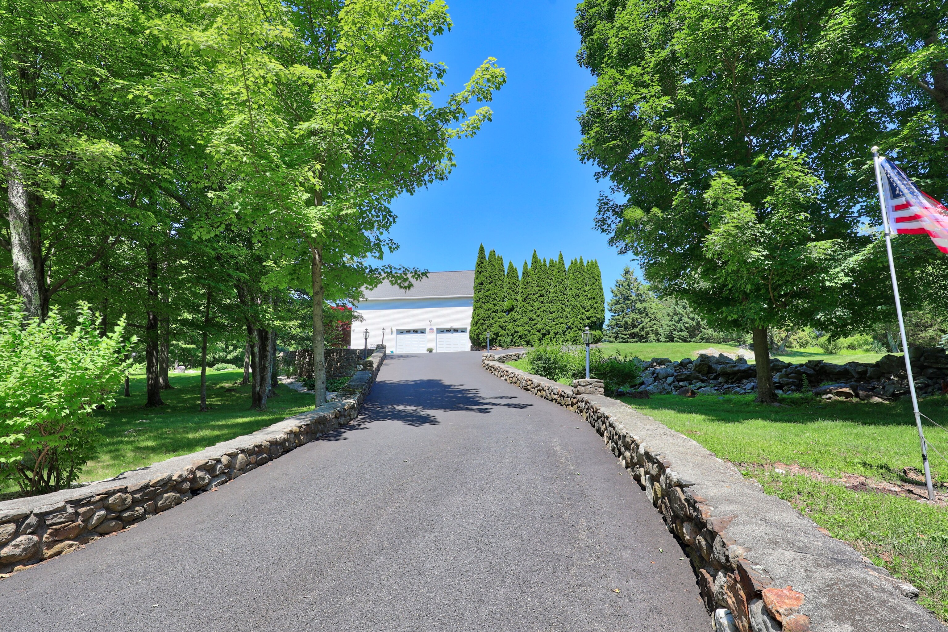 21 Hidden Pond Drive Watertown, CT 06795 - Photo 37 of 40 a pathway of a house with a yard