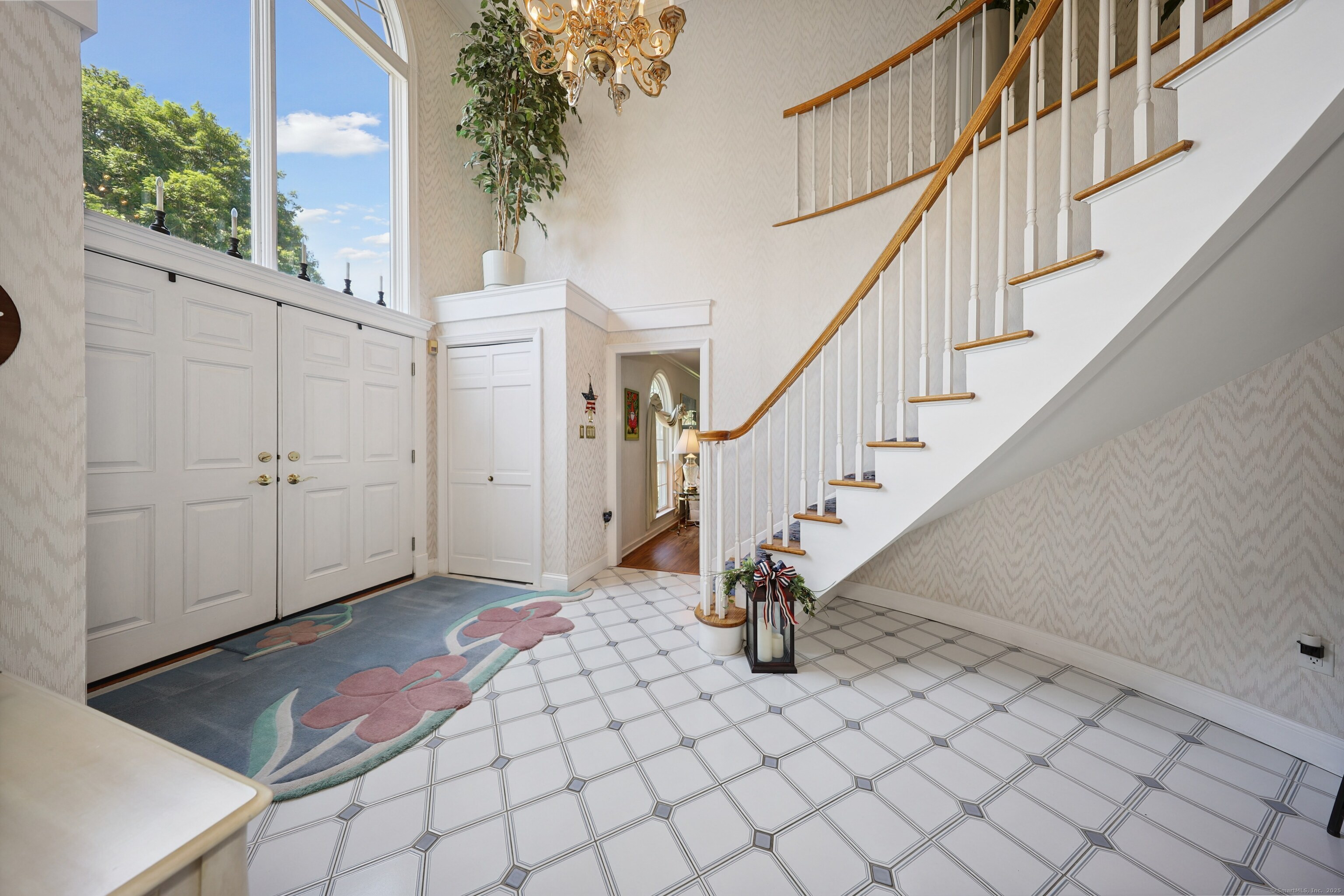 21 Hidden Pond Drive Watertown, CT 06795 - Photo 4 of 40 a view of entryway with wooden floor and stairs