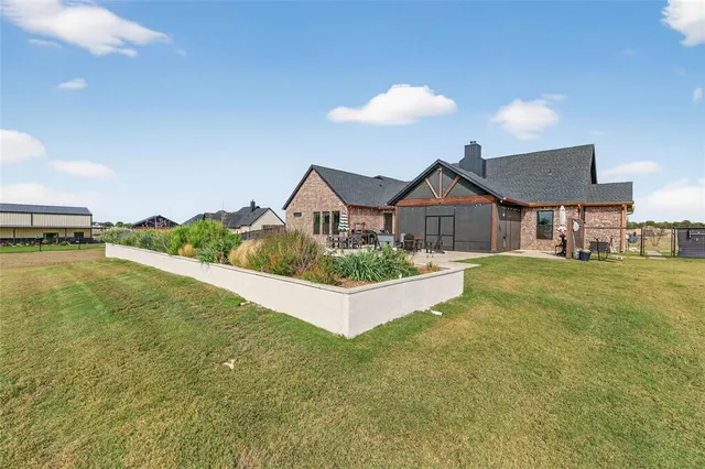 a view of a house with a ocean view