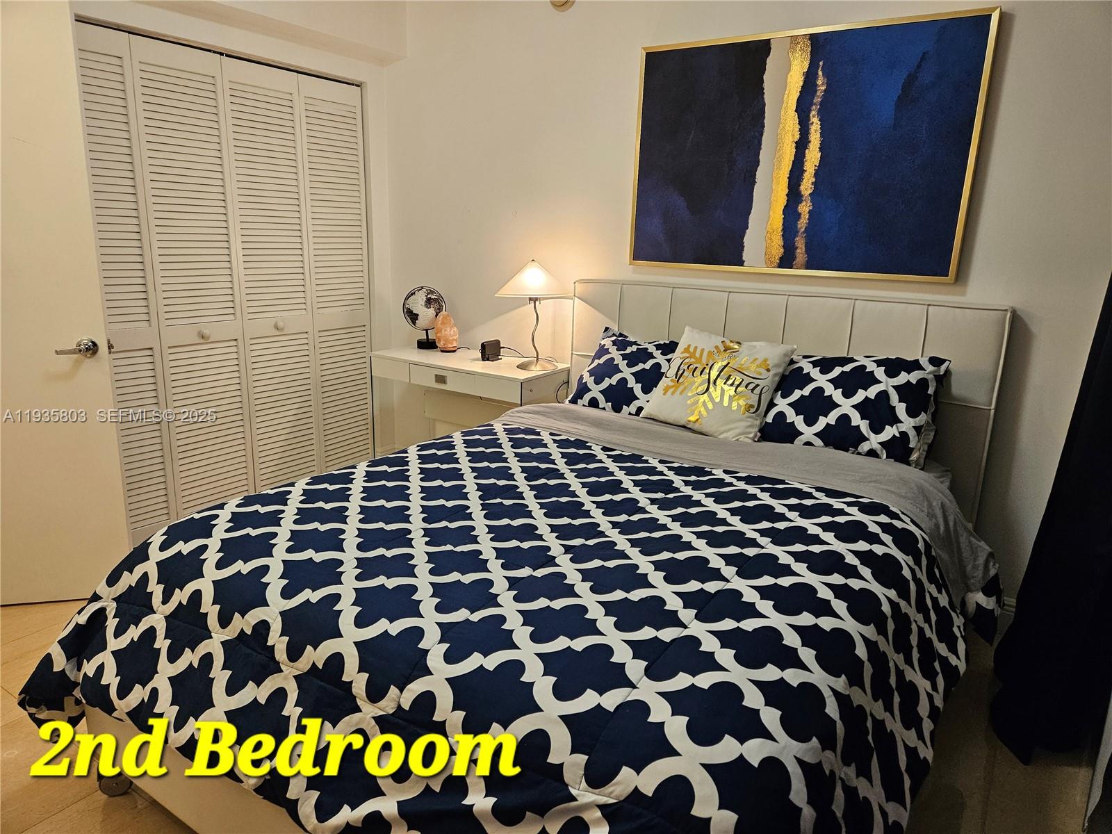 41 Southeast 5th Street, Unit 1517 Miami, FL 33131 - Photo 35 of 50 a bathroom with a black and white checkered floor