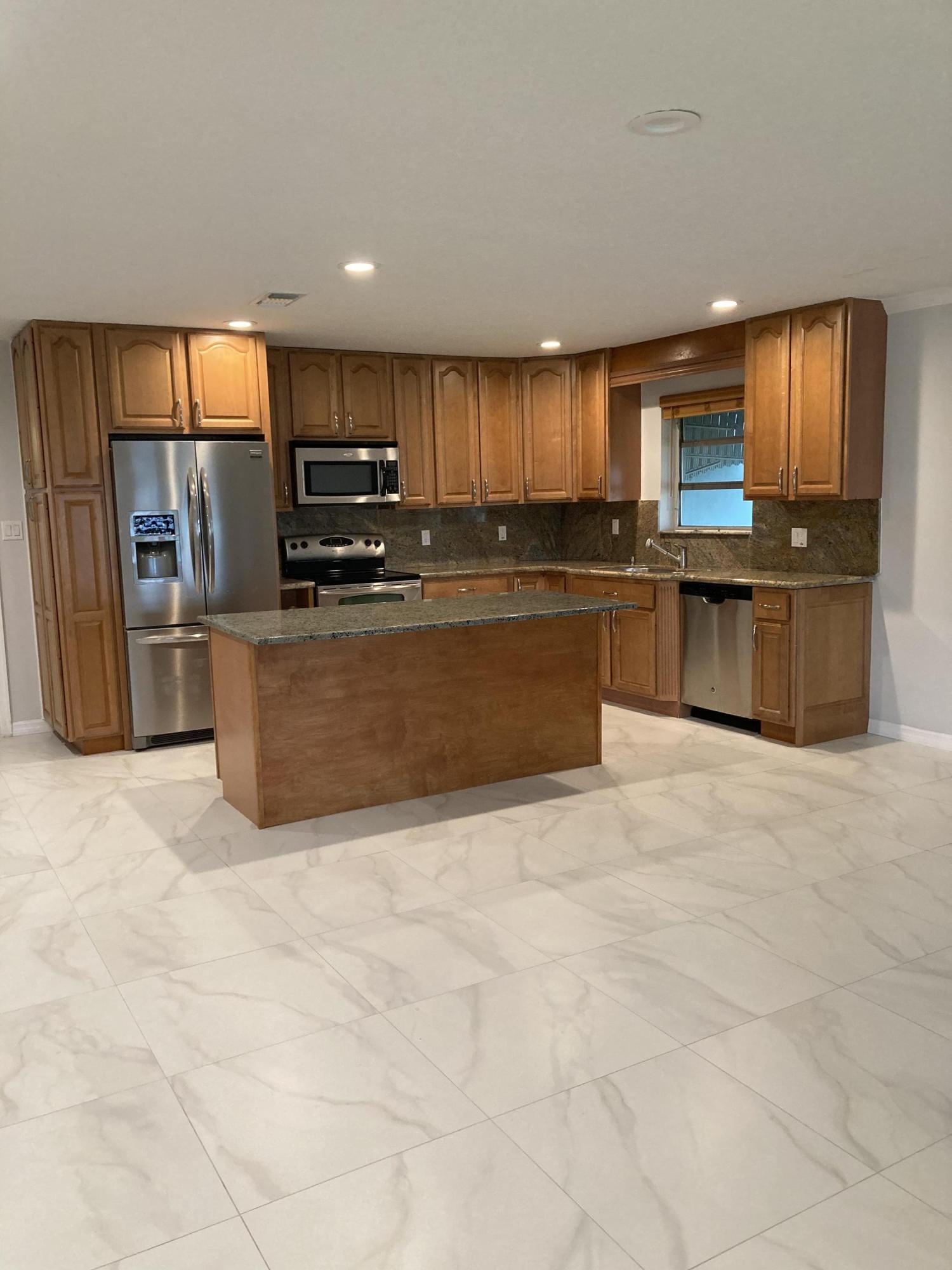 744 Elm Road West Palm Beach, FL 33409 - Photo 1 of 20 BB62E853-E74E-47DE-9621-181C3B2067DC