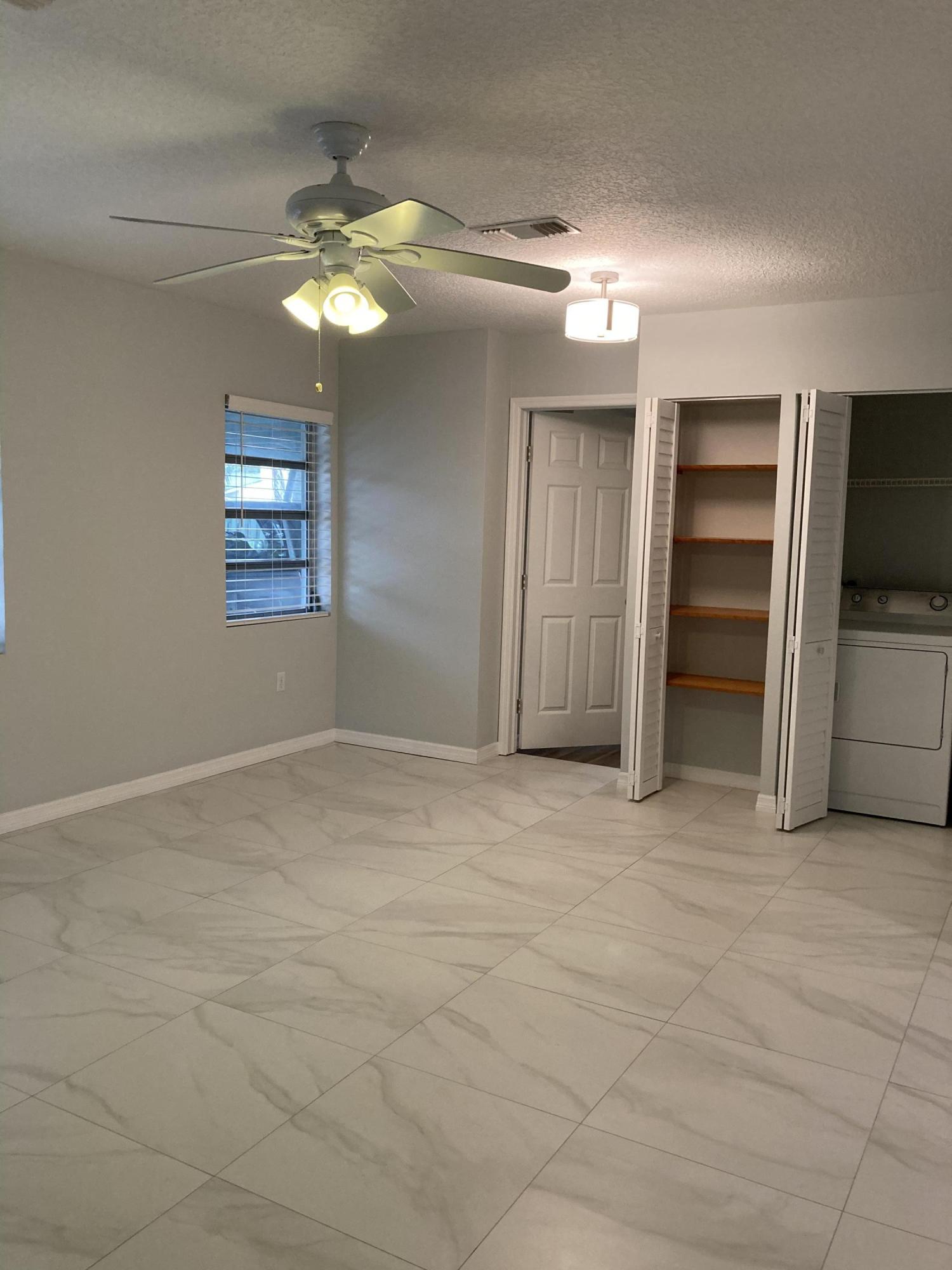 744 Elm Road West Palm Beach, FL 33409 - Photo 11 of 20 F3776A72-FBEB-43C0-AA2B-23D581A3ADA1