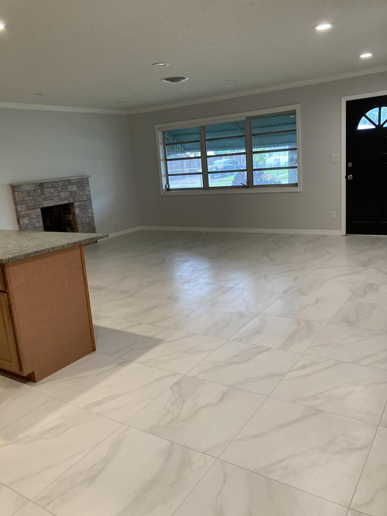 744 Elm Road West Palm Beach, FL 33409 - Photo 2 of 20 A3F30AB7-D313-4074-8330-E945C96CB19C