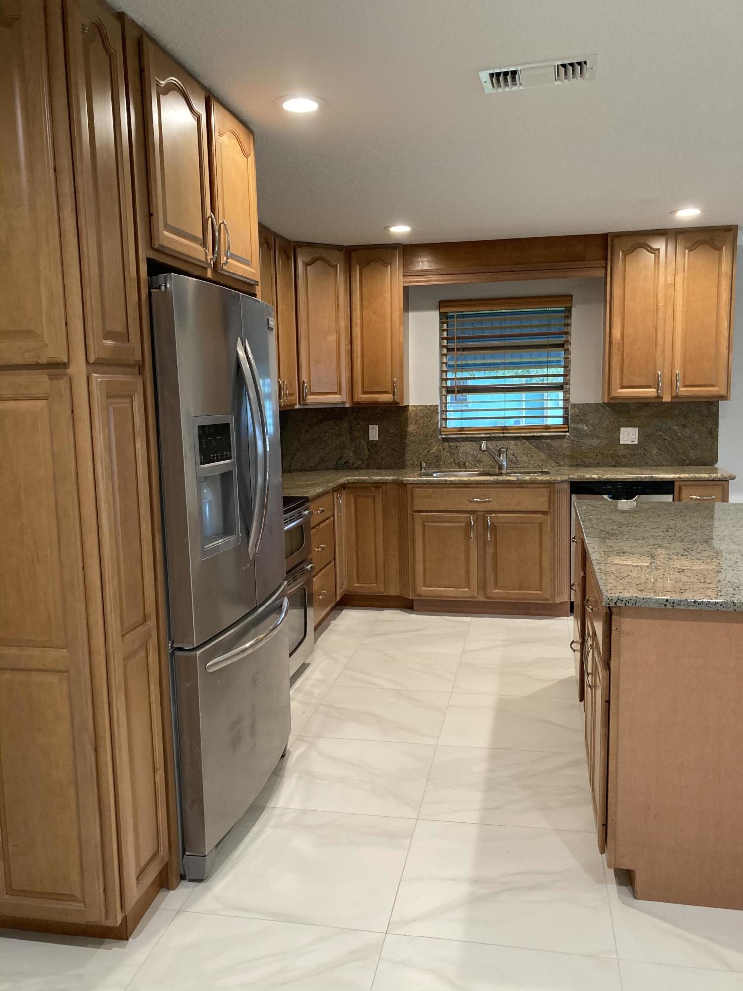 744 Elm Road West Palm Beach, FL 33409 - Photo 4 of 20 935075F8-3FBE-4615-8437-D88E20108758