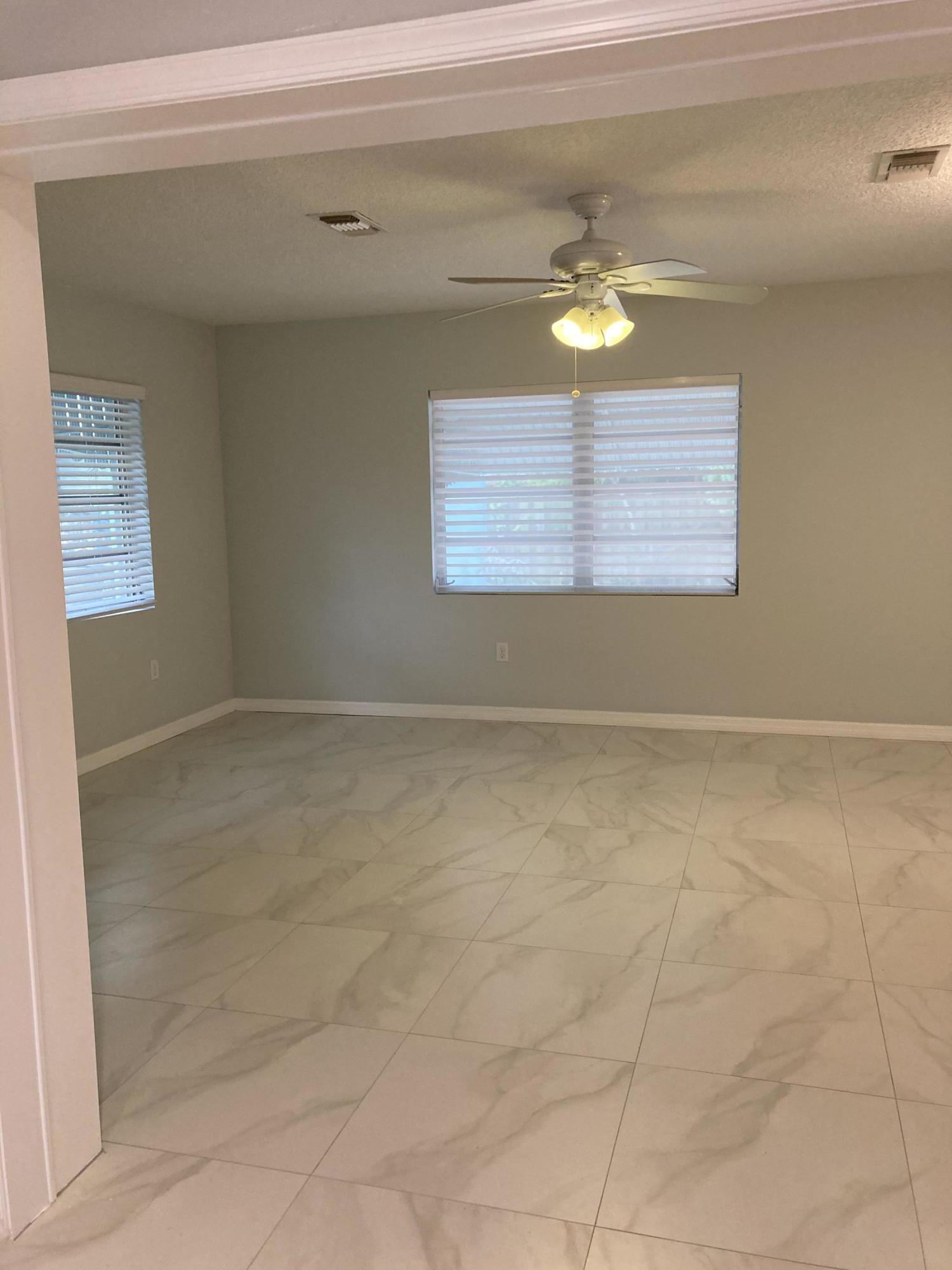 744 Elm Road West Palm Beach, FL 33409 - Photo 10 of 20 7BBE70F0-36EF-4A68-B024-C4143F7CBA23