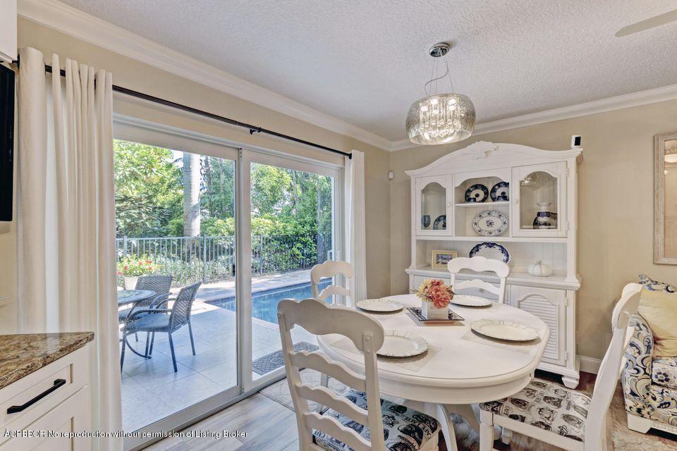 18905 Southeast County Line Road Jupiter, FL 33469 - Photo 16 of 74 a view of a dining room with furniture window and outside view