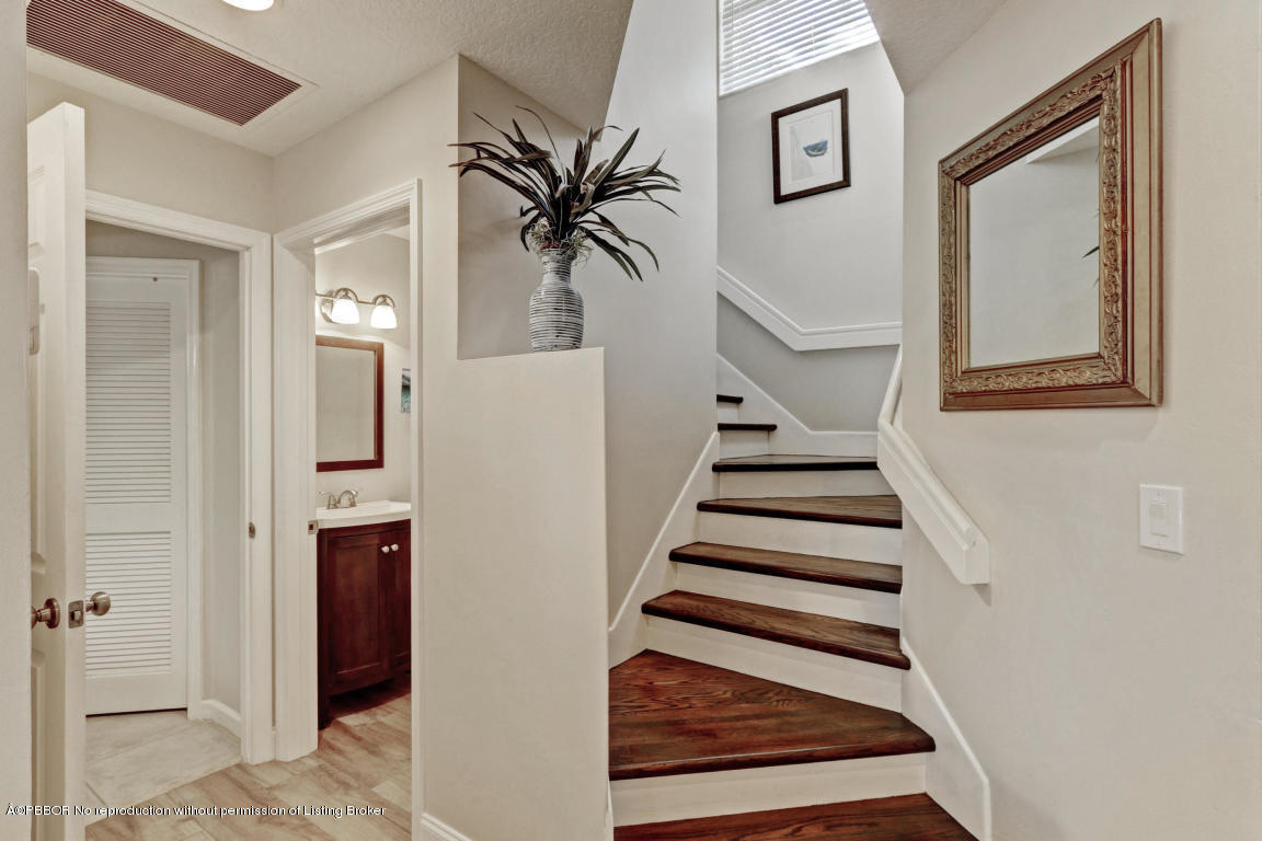 18905 Southeast County Line Road Jupiter, FL 33469 - Photo 24 of 74 a view of entryway and hall with wooden floor