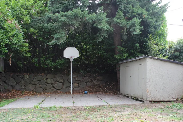 a house view with a backyard space