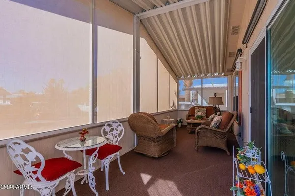 a living room with furniture and a window