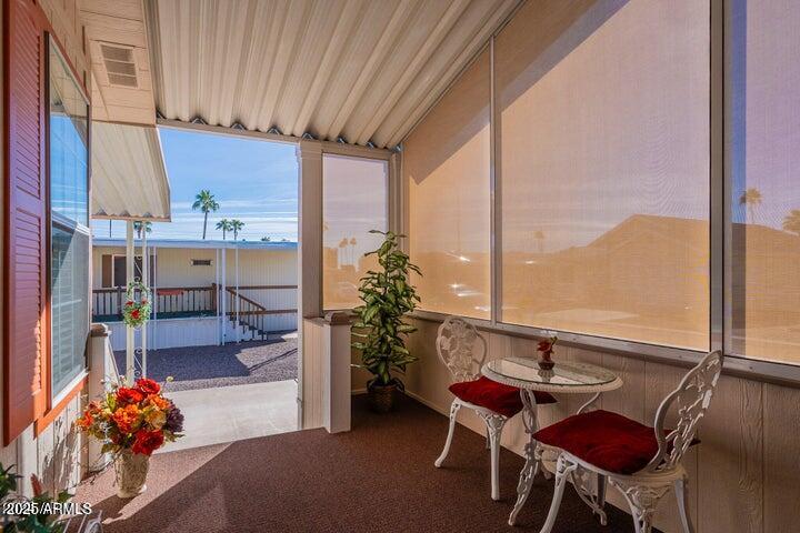201 South Greenfield Road, Unit 176 Mesa, AZ 85206 - Photo 14 of 61 a view of a dining room with furniture window and outside view