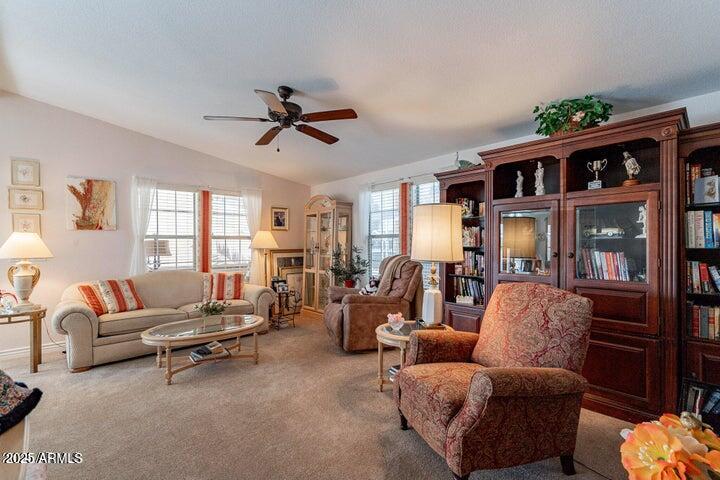 201 South Greenfield Road, Unit 176 Mesa, AZ 85206 - Photo 19 of 61 a living room with furniture and a window