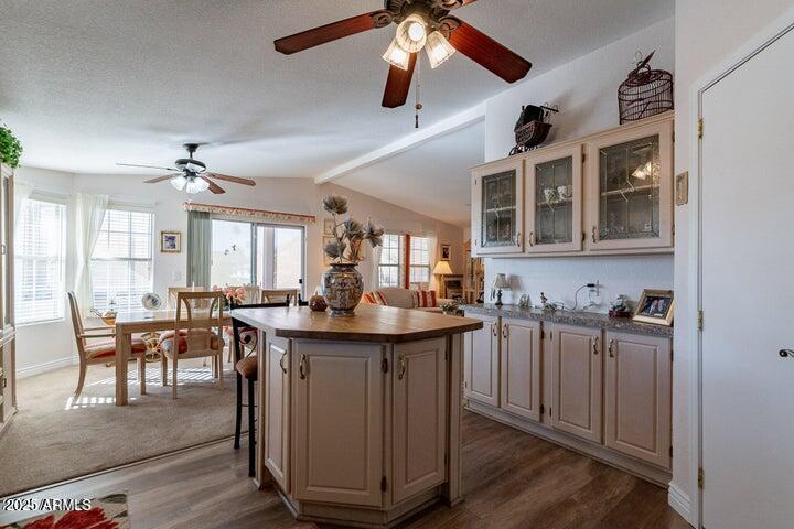 201 South Greenfield Road, Unit 176 Mesa, AZ 85206 - Photo 23 of 61 a view of a dining room with furniture window and wooden floor