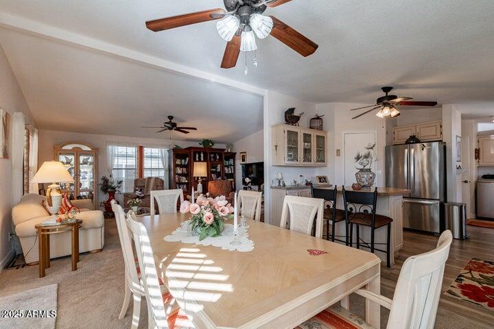 201 South Greenfield Road, Unit 176 Mesa, AZ 85206 - Photo 29 of 61 a view of a dining room with furniture