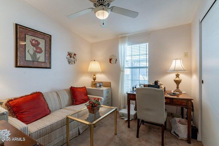 201 South Greenfield Road, Unit 176 Mesa, AZ 85206 - Photo 30 of 61 a living room with furniture and a large window