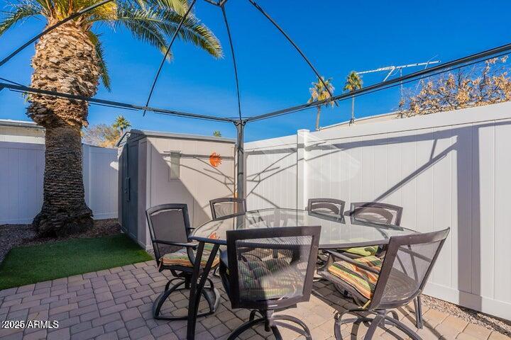 201 South Greenfield Road, Unit 176 Mesa, AZ 85206 - Photo 47 of 61 a view of a chairs and table in the patio