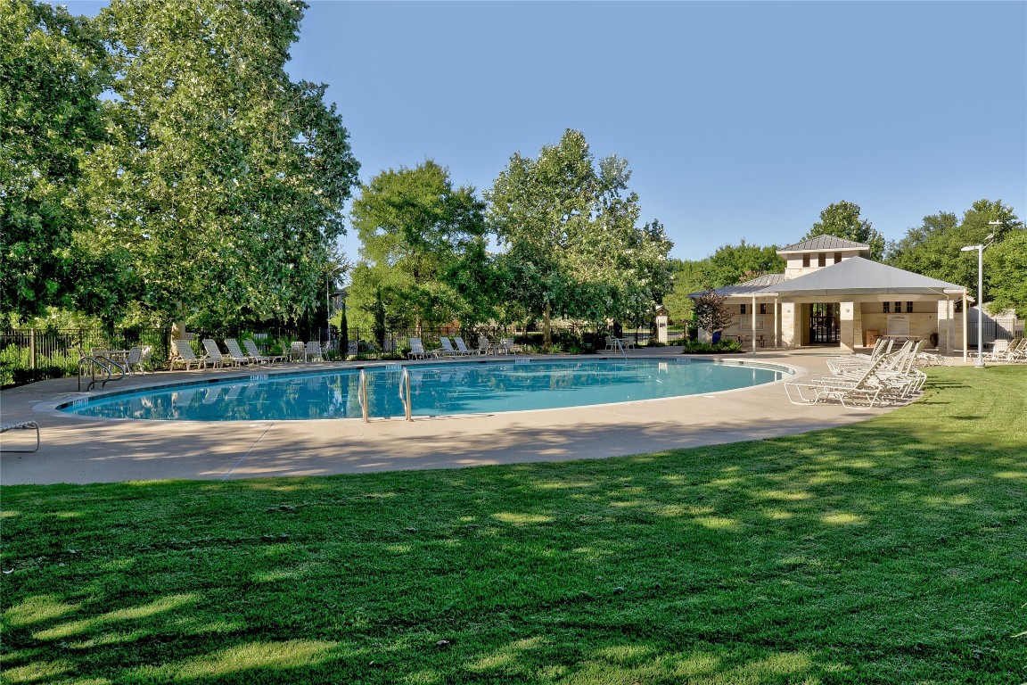 11116 Jim Thorpe Lane Austin, TX 78748 - Photo 21 of 31 a view of yard with swimming pool and green space
