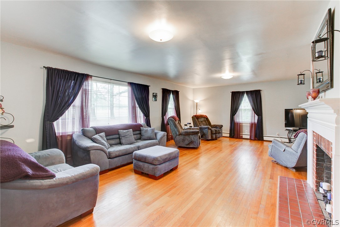 18506 Beaver Dam Road Beaverdam, VA 23015 - Photo 11 of 44 a living room with furniture and a wooden floor