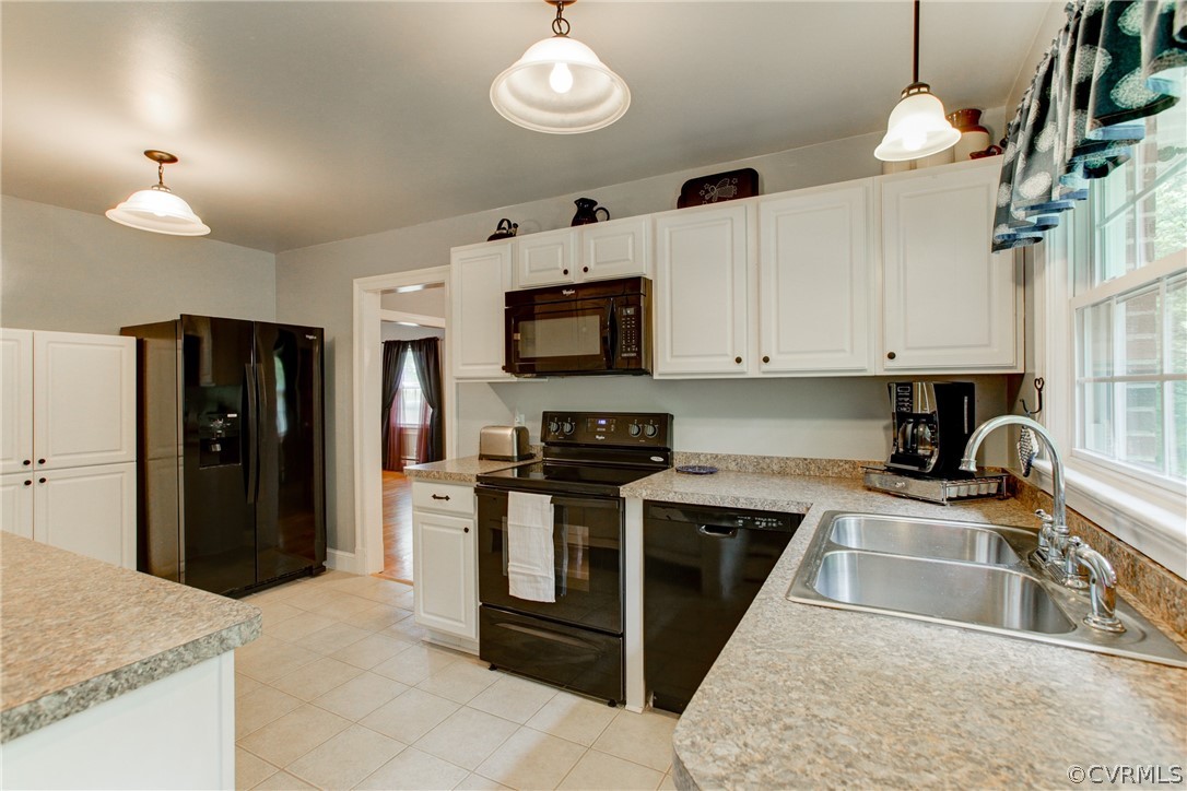 18506 Beaver Dam Road Beaverdam, VA 23015 - Photo 5 of 44 a kitchen with stainless steel appliances granite countertop a sink a stove and a refrigerator