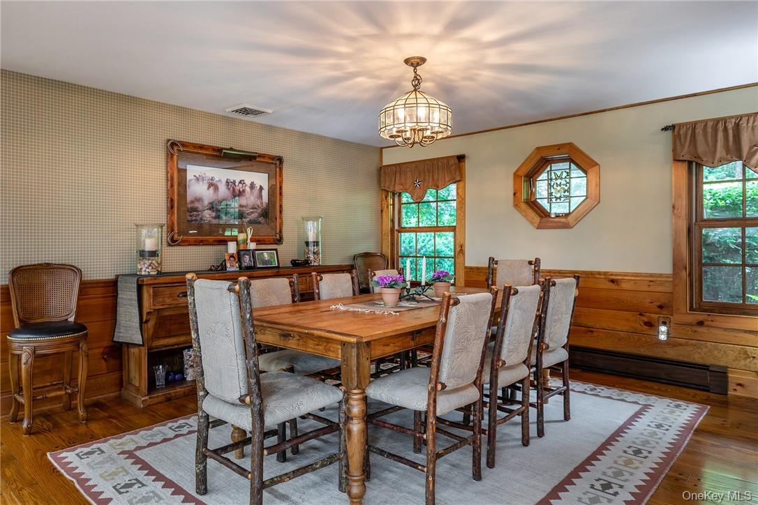 617 Bean River Road Pine Plains, NY 12546 - Photo 12 of 40 a view of a dining room with furniture