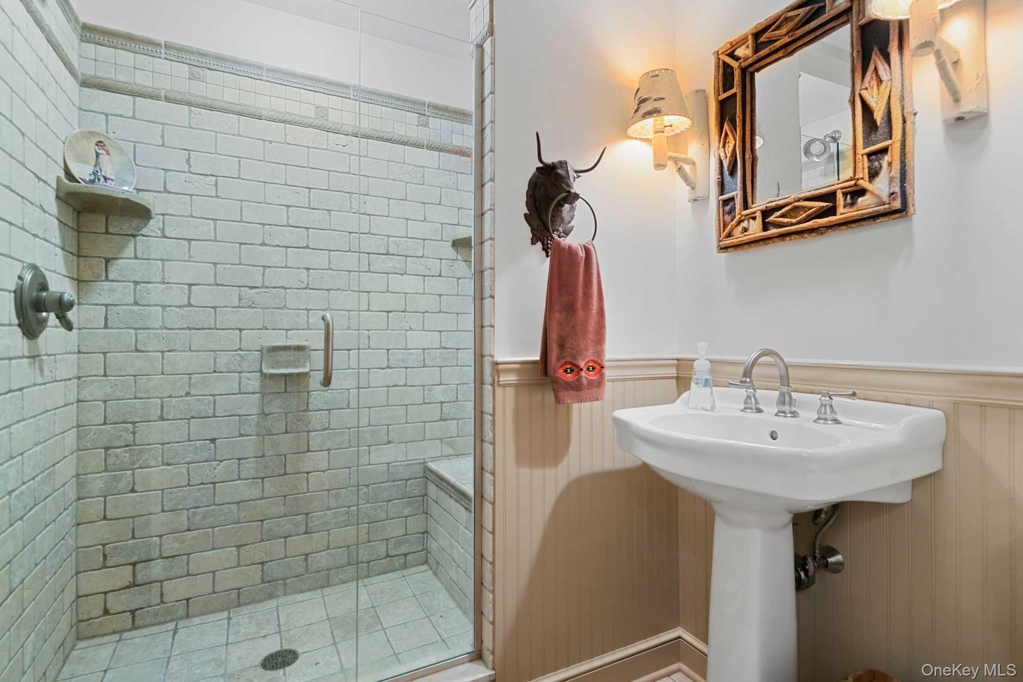 617 Bean River Road Pine Plains, NY 12546 - Photo 20 of 40 a bathroom with a sink a mirror and shower