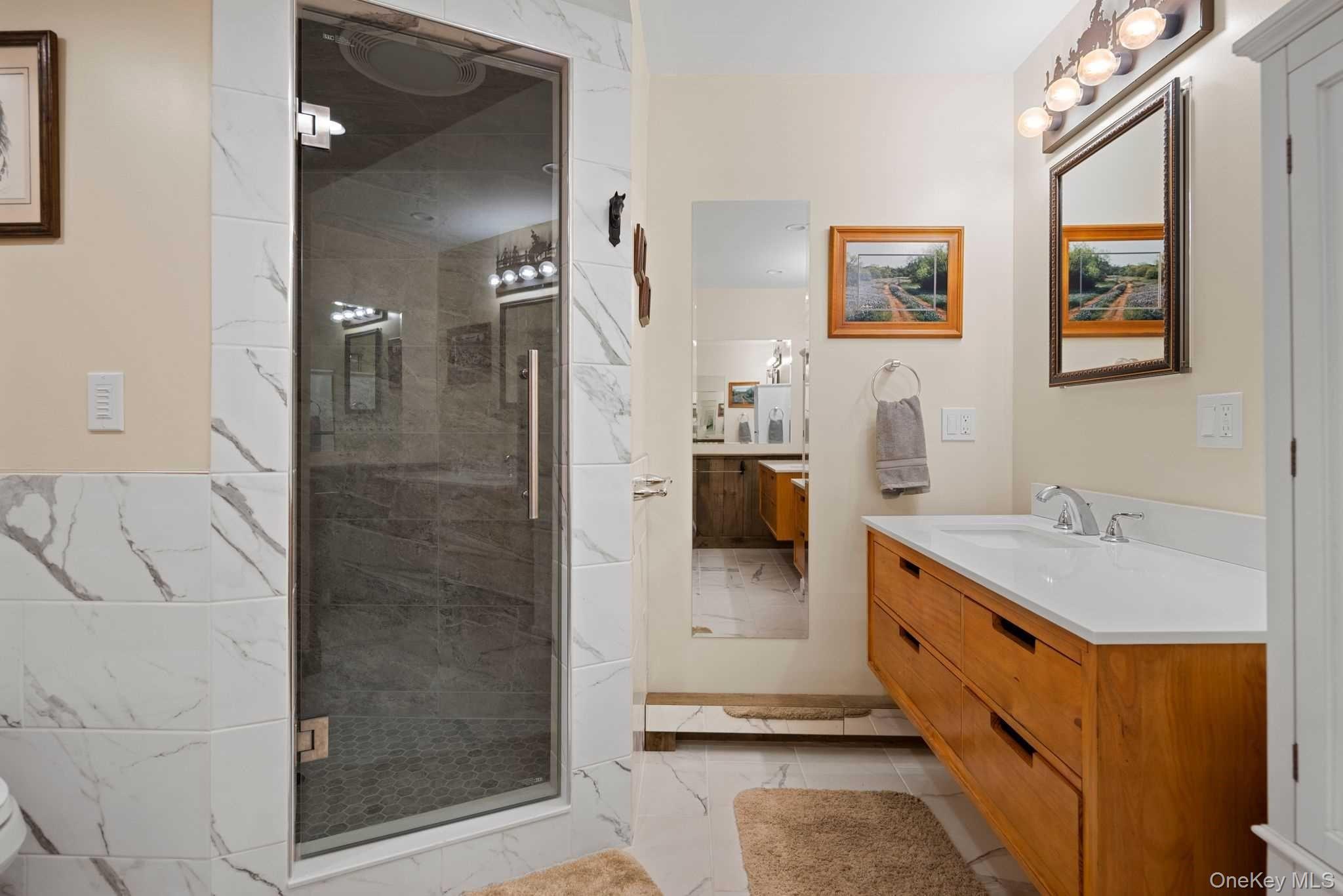 617 Bean River Road Pine Plains, NY 12546 - Photo 25 of 40 a bathroom with a tub sink and mirror