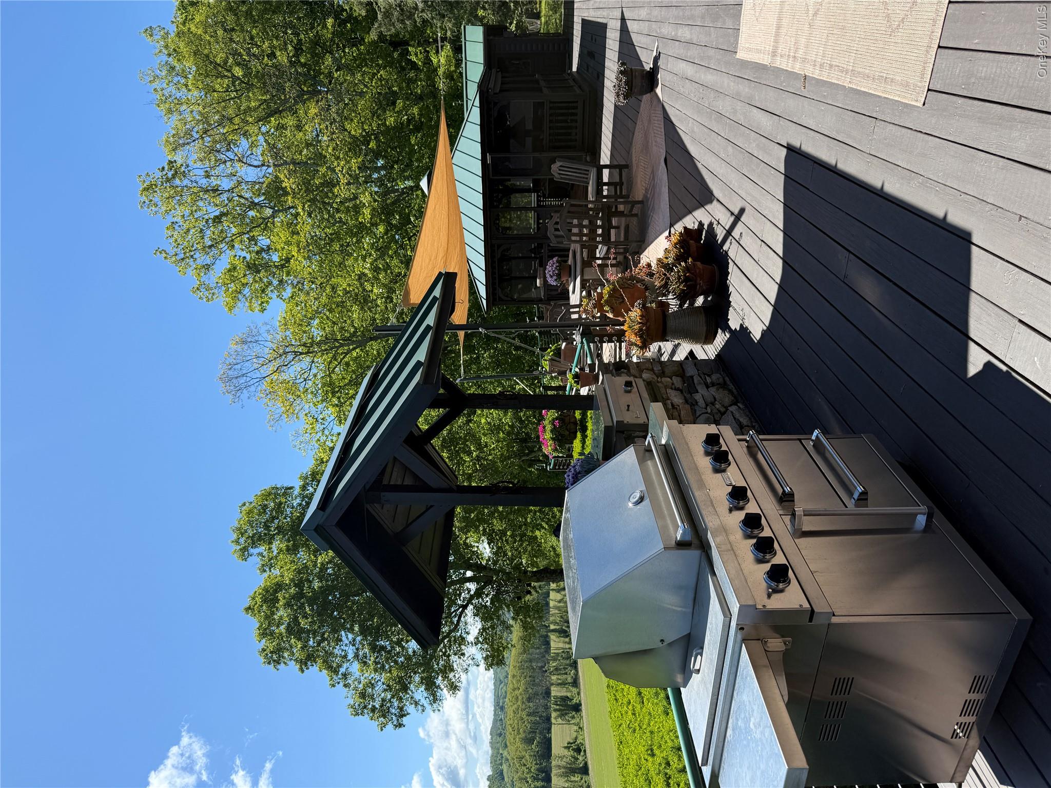 617 Bean River Road Pine Plains, NY 12546 - Photo 27 of 40 a view of a backyard with sitting area