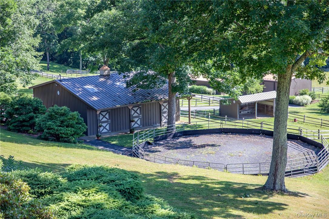 617 Bean River Road Pine Plains, NY 12546 - Photo 34 of 40 a view of a house with backyard and sitting area