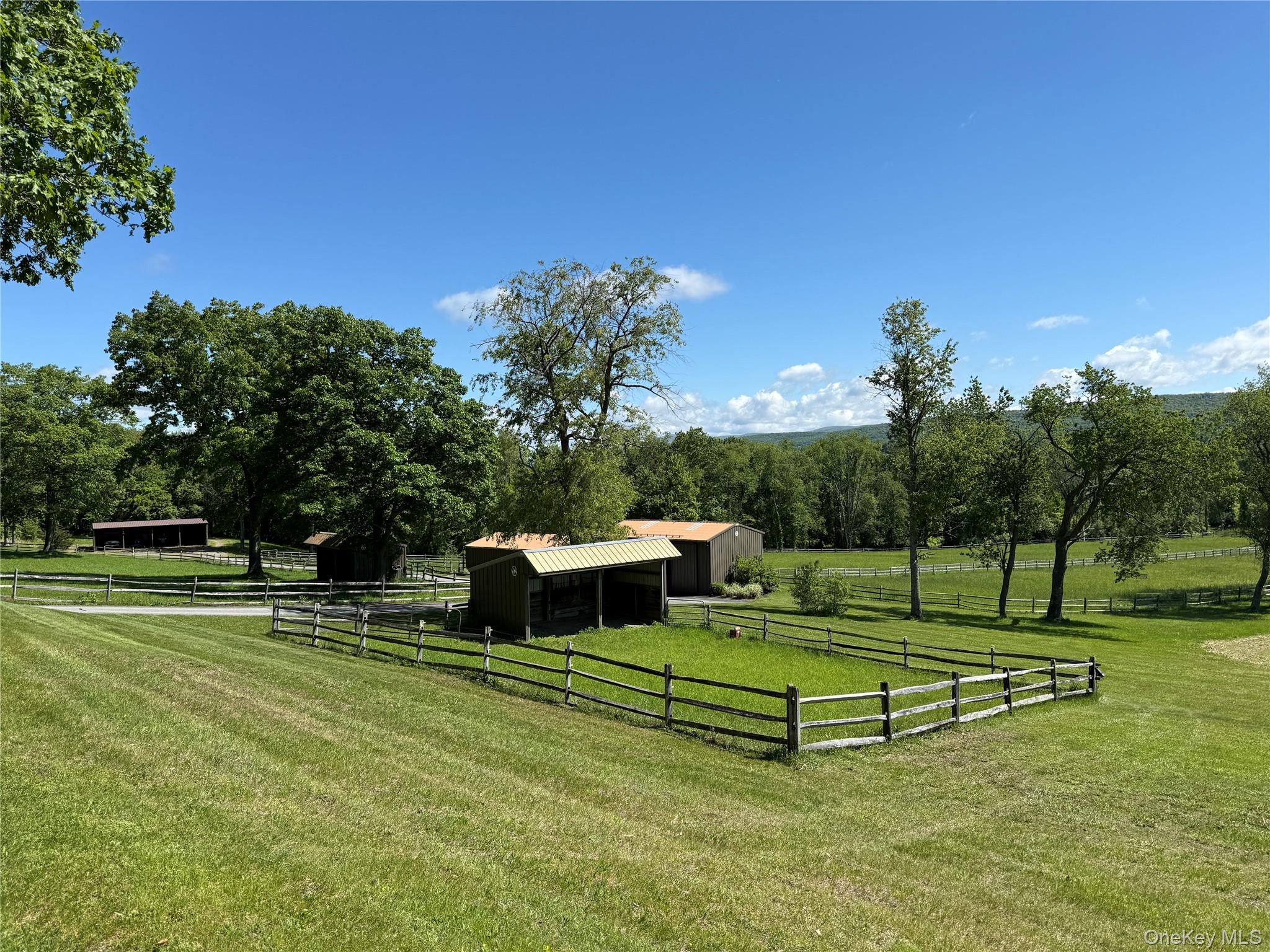 617 Bean River Road Pine Plains, NY 12546 - Photo 36 of 40 a view of a park with benches