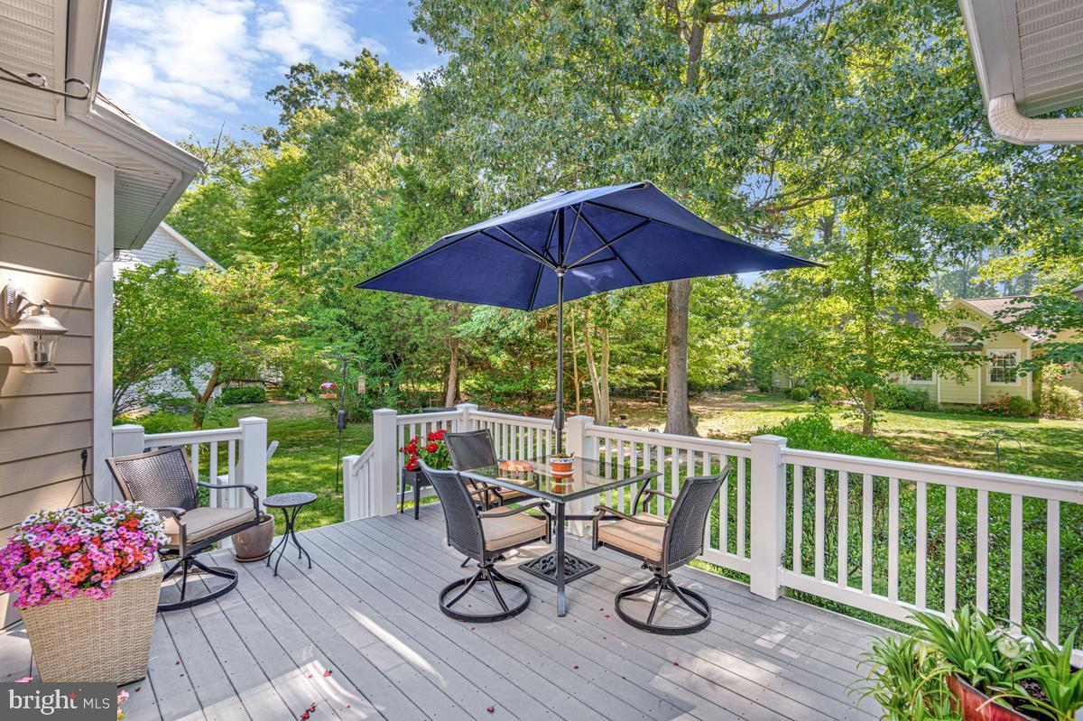 11565 Magnolia Court Issue, MD 20645 - Photo 24 of 68 a view of a table and chairs on the roof deck